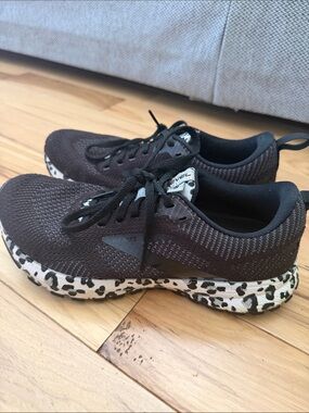 Brooks Black Knit Sneakers with Black-and-White Leopard Midsole revel 5